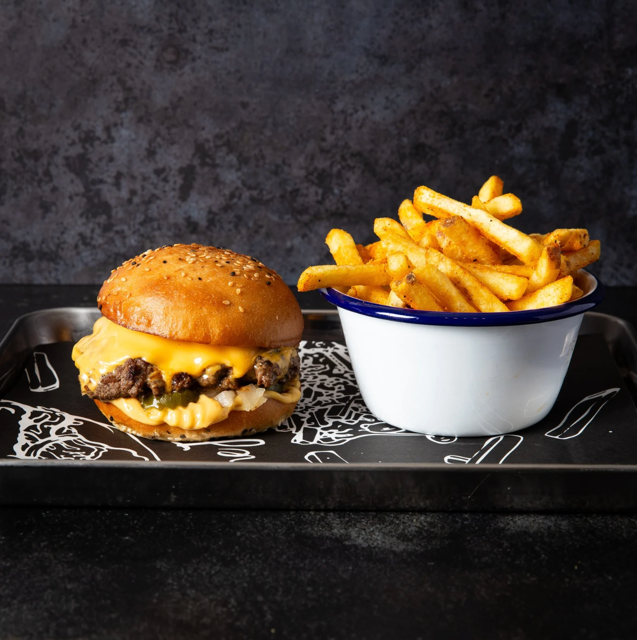 A Flavour Trailer bacon cheeseburger with loaded fries